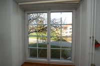 Holzfenster mit Espagnolletenverschluss